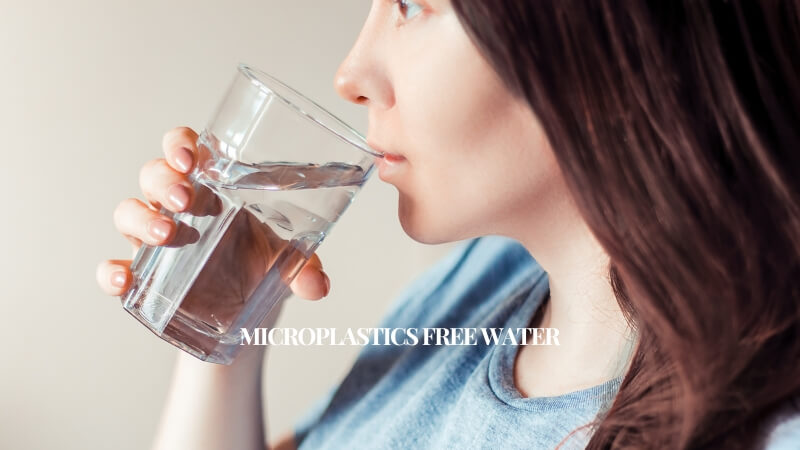 women drinking microplastic free water